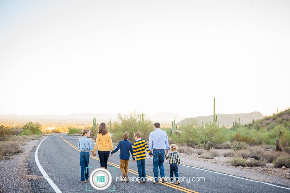 family photos on road in the desert